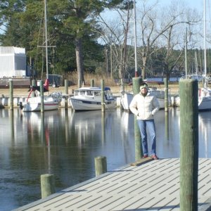 Sea Baby in ice at Point Marina in Whortonsville, NC.  That's The Captain standing on the dock across Coffee Creek.  Note:  Ice is only 1/2" thick.(10JAN10)