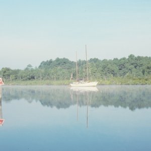 Sloop near West Neck Creek entrance in the morning mist.

Scanned slide taken in July 1989
