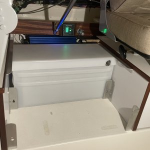 the battery weighs 135 lbs and can be shifted 10\" towards midship to help trim when single handing... then moved starboard with passngers.   Eventually, if needed I can add a second there in parallel for mucho amp hours