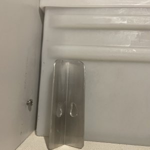 the aluminum angle brackets slide on and off bolts had nylock nuts and washers on the inside of the drawer sliders