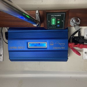 angle aluminum screwed into cabinets and bolted to plywood panel
House Battery 2 connects directly to inverter via buss so short run reduces resistance as the big battery?s main job is 110v AC and backup for House Battery 1 if needed.