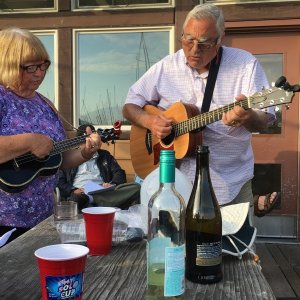 Media 'Patty and Pat leading the sing-along after the potluck on Saturday night' in album 'Setting out on a Thursday evening after work for 10 days on the water, first stop: Bellingham CBGT. Looks like another C-Brat on the Forklift might be joining!'