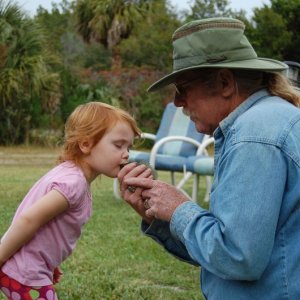 Kissing her first fish