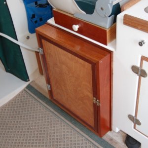 Media 'Had to extend the cabinet by 3 inches to accomidate the Waeco C40' in album 'Factory installed receptical looking astern. Maybe 1/4 clearance between seat and receptical'