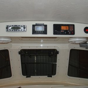 Media 'Built larger overhead console so that it is supportd by two bolts on each side and deep enough to handle 10" speakers.  Unit was gelcoated to look like factory finish.' in album 'Remove all switches, gauges, displays'