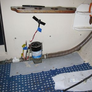Media 'C-Dory installed the original pump and cover with wood screws. I quickly discovered that the deck holes were waterlogged. I dried and filled them with epoxy. For 16 years nothing but Sikaflex(5200) held them (pump and cover) in place. The inserts are a more elegant approach. 5 were used for the cover and 2 for the pump.' in album 'IMG 0104'