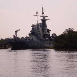 USS North Carolina across the Cape Fear River.