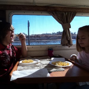 Kids enjoying making popcorn while underway