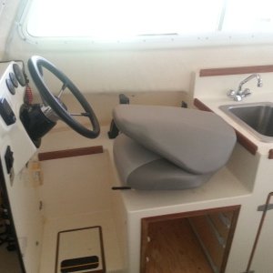 Media 'Helm Seat Folded' in album 'New helm seat, Attwood Centric? model.  This is the helm seat swiveled to 45 degrees'