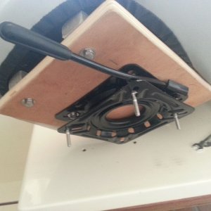 Media 'Plain, $19. locking swivel.  Used 3/4 ply to get a bit more height and to mount angled blocks to tilt the seat back some.' in album 'New helm seat, Attwood Centric? model.  This is the helm seat swiveled to 45 degrees'