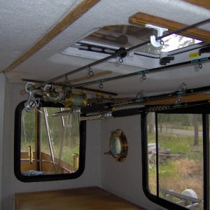 Holds 4 rod and reels right now. Might be able to add one more reversed.