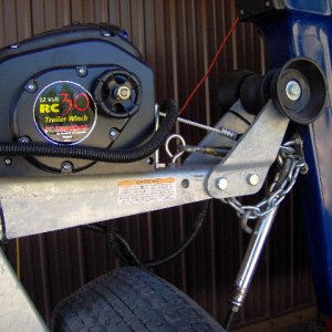 Winch instructions always say " Don't hold with winch. Old winch was craping out, So,... two turn buckles