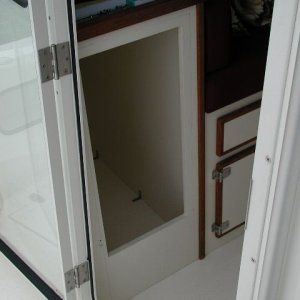 Media 'Rear port side cabinet, deep but hard to access.' in album 'Spring type strut to hold doors open.'