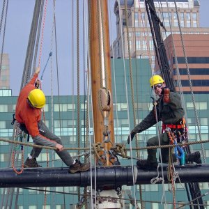 Top yard stern mast 120' off the water. Chad on the left I am on the right still drinking bean juice.