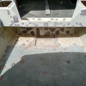 I opened up all areas that had fasteners, that?s a lot of holes. There was some localized core rot, more holes were drilled around those areas and all coring removed. Holes were filled with thickened epoxy or 8lb density foam in larger areas.
