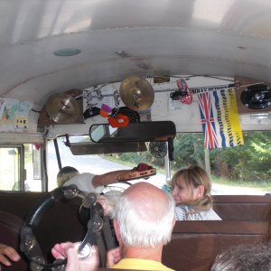 Our incredible driver, Tommy Transit, handing out musical instruments on the ride to the Hummingbird Pub, Montague Harbour. Shouldn't you have your eyes on the road Tommy?