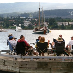 Cocktail hour(s) at the end of the pier at Newcastle Island, with Nanaimo in background.