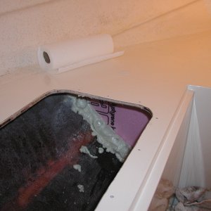 Shoved the front compartment full of foam and installed a pink foam bulkhead to hold it. I used some filler foam till the forward compartment was full. Note the 6" access I cut.
