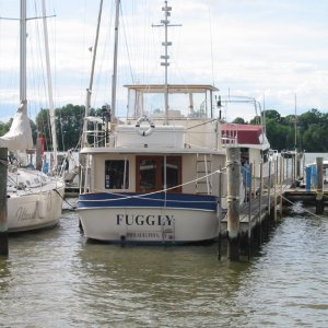 This is a Krogen Manatee that was docked at Lankford. I thought that naming an Mantee "Fuggly" was hilarious. (Scott on grin)