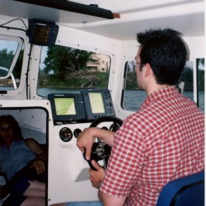Chris at the helm.jpg