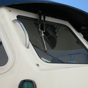 Safety grab handles and Pantographic wiper arms added. Handles are easily reached from inside the cabin for fender applications.