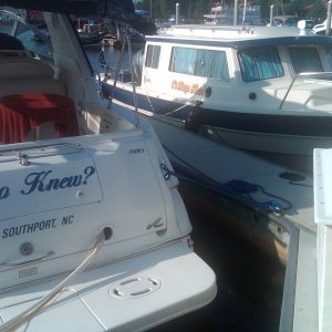 Media 'Our first overnight.  Barefoot Landing SC.  Next to our friends in "Who Knew".  Window shades are up - Sunbrella stripe.' in album 'The first Slap Shot, an Eastern 18.  Loved the boat, just too small.'