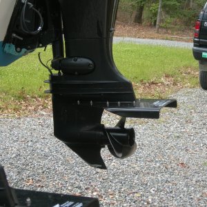 Permatrims on Suzuki 115's.  Really makes the boat pop up on plane quickly!!