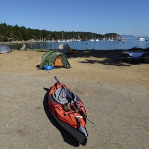 Kayak on isthmus looking towards Fossil Bay
