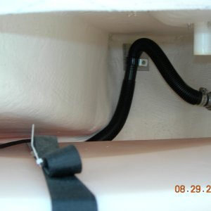 I used the existing through -hull for the additional 1 1/8" dia. bilge pump discharge hose.