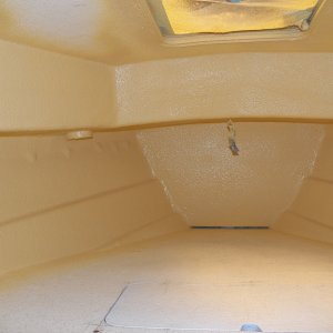I am concentrating mostly on the V berth area for noise and condensation abatement.  Two coats was enough so that I could no longer see the roving in the fiberglass layup.  I put on four coats in the V berth and two in the cabin.