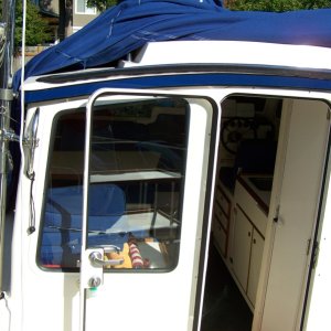 Mounted at rear of cabin for easy access and operation with out interferring with activities in cockpit