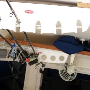 Rod storage on ceiling in cabin (4200 no screws) keeps rods out of the way and secured when we are off the boat.