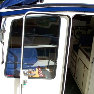 Media 'Davit support with arm removed to prevent interference with storage cover' in album 'CD25 cockpit table and storage shelf. Shelves are made from 16x32 nylon game boards available at Cabelas.'