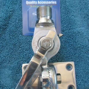 Original antenna mount. I cleaned this mount up and reused it for my new antenna. (Box in background contained new cable connector part, but contents are not shown.)