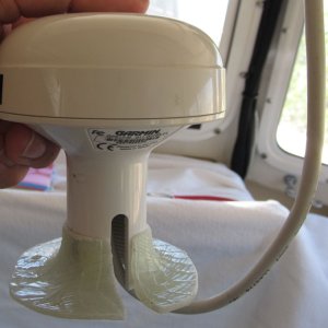 Media '' in album 'Original antenna mount. I cleaned this mount up and reused it for my new antenna. (Box in background contained new cable connector part, but contents are not shown.)'