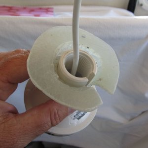 Media '' in album 'Original antenna mount. I cleaned this mount up and reused it for my new antenna. (Box in background contained new cable connector part, but contents are not shown.)'