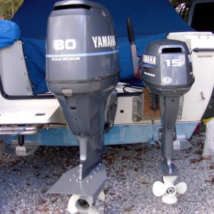 Media 'I run the kicker with the main raised and leaned to port.  Good room to turn the kicker. I enjoy cruising from the cockpit and don't use a steering rod.' in album '"Mini Jacker" fixed kicker mount.  Allows the engine to sit a dab to the rear.Help with turning both directions and with the angle of the stern to keep the prop out of the water while running the main.'