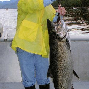 My sister with a fish.  (Trick photo: she's only 3 feet tall).