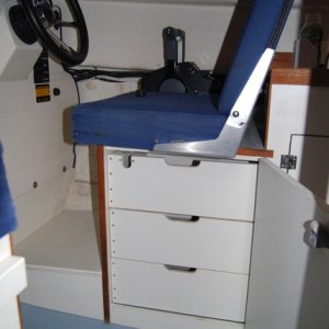 Media 'Custom cabinet and drawers under the helm seat.' in album 'HolesDrilledOutAndUndercut'