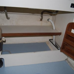 Media 'Cabinet and shelve under galley' in album 'HolesDrilledOutAndUndercut'