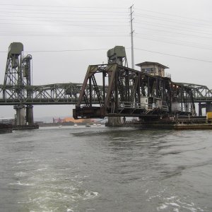 (Anita Marie) Started shutting on us half way under the bridge. Kind of unnerving to look over and see a tresle coming at you. Anna Leigh had to WOT to get thru. Left a lot of the pod on the other side as you can see.