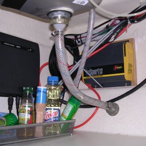 Battery tender/charger beneath sink.