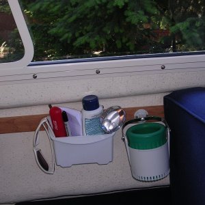 Port mount for accessories such as shown.  1/2" oak secured with 5200.
