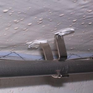 Curtain rod holder glued to cabin roof with 5200