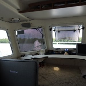 Forward part of full exterior shade cloth curtains