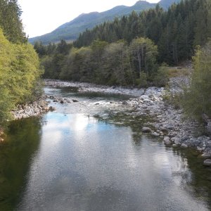 The Gold River, another that I kayaked years ago.  In the spring, it roars along from snow melt.  Now, it looks like a good river for an inner tube.  Just kidding.  On river right is a triangle sign warning boaters that danger lies ahead.
