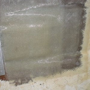 port/aft mounting bracket for the fuel tank glassed in place