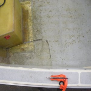 this view shows how the tanks hide up under the side, maximizing deck space, this with the smaller transom box makes for a really big back deck