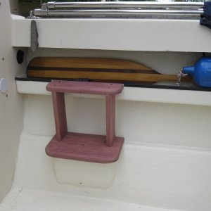 Media 'My solution to the big step in getting in and out of the cockpit.  Added a second step attached to tray below gunwale and supported by two vertical members.  Wood is purpleheart which is one third price of  teak and weathers to look like teak.' in album 'I could have purchased a swim platform made from 'frozen snot' (fiberglass), but decided to build one using teak.'