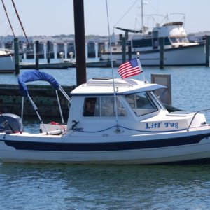 Media 'A beautiful sight of Litl'Tug  departing the marina entrance.' in album 'SeaAngel and Litl'Tug visit at the 
Sunset Grill, Willoughby Marina which
is VERY friendly with great seafood.'
